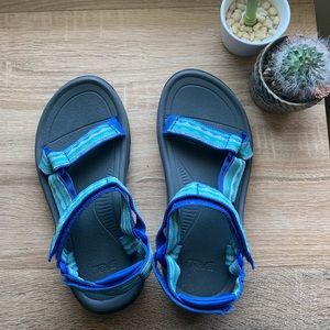 Teva (blue, green, white)